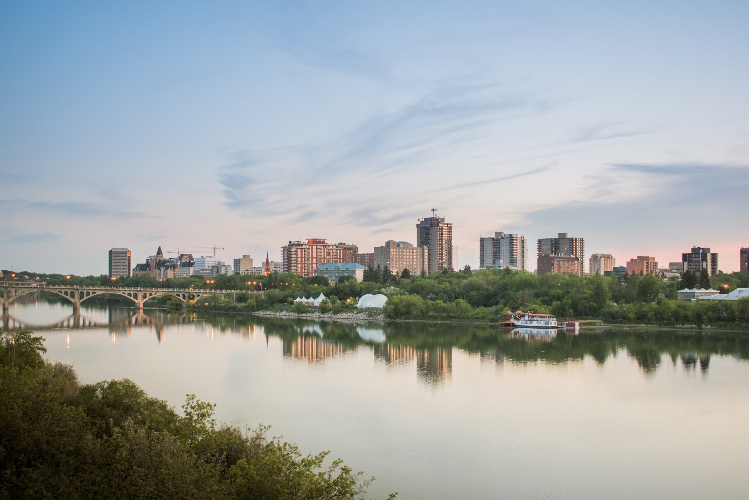 The South Saskatchewan River and the Saskatoon skyline at dusk